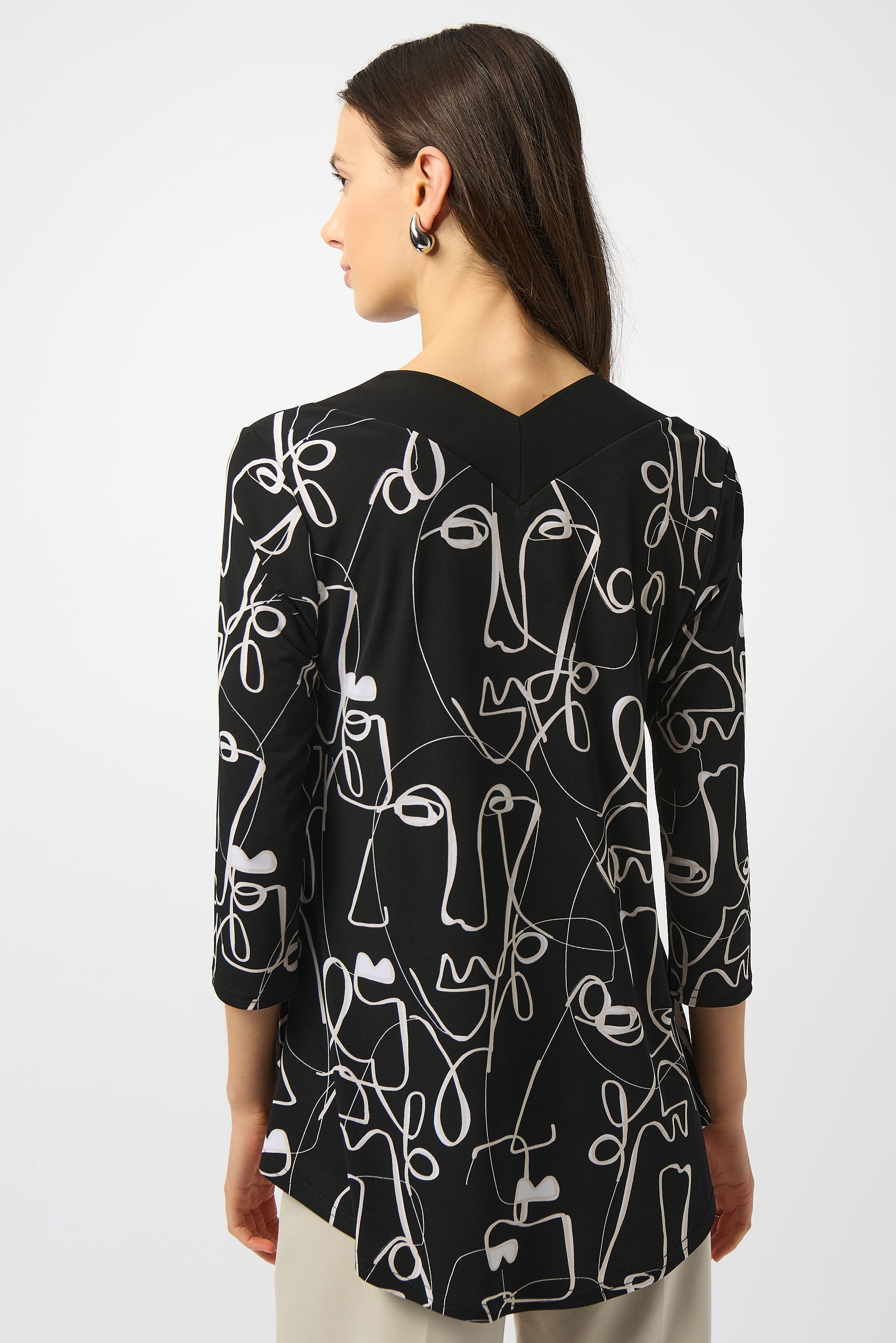 Abstract Face Print V-Neck Top